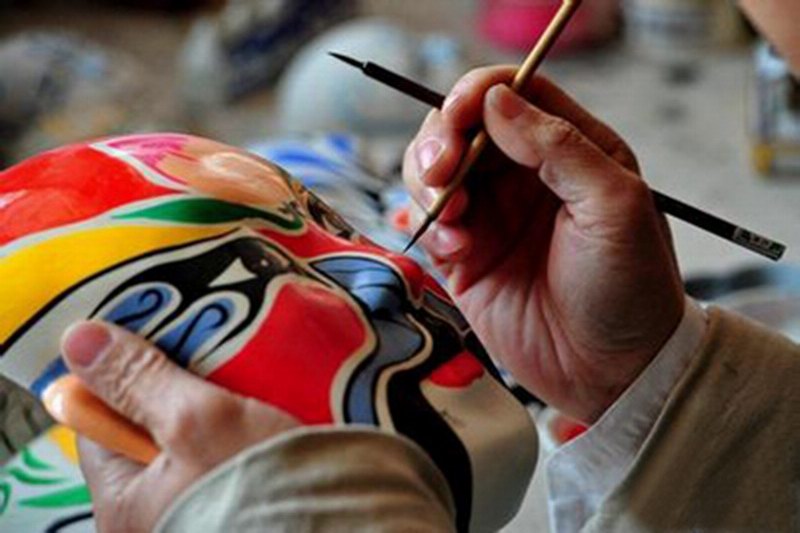 海南海口画脸谱民艺表演